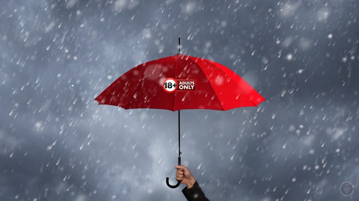 hand holding a red umbrella